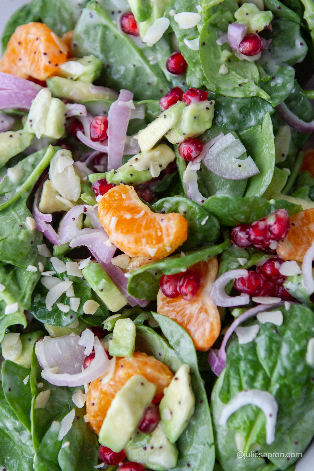 close up of mixed salad with mandarins 