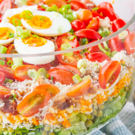 7 layer salad in glass bowl