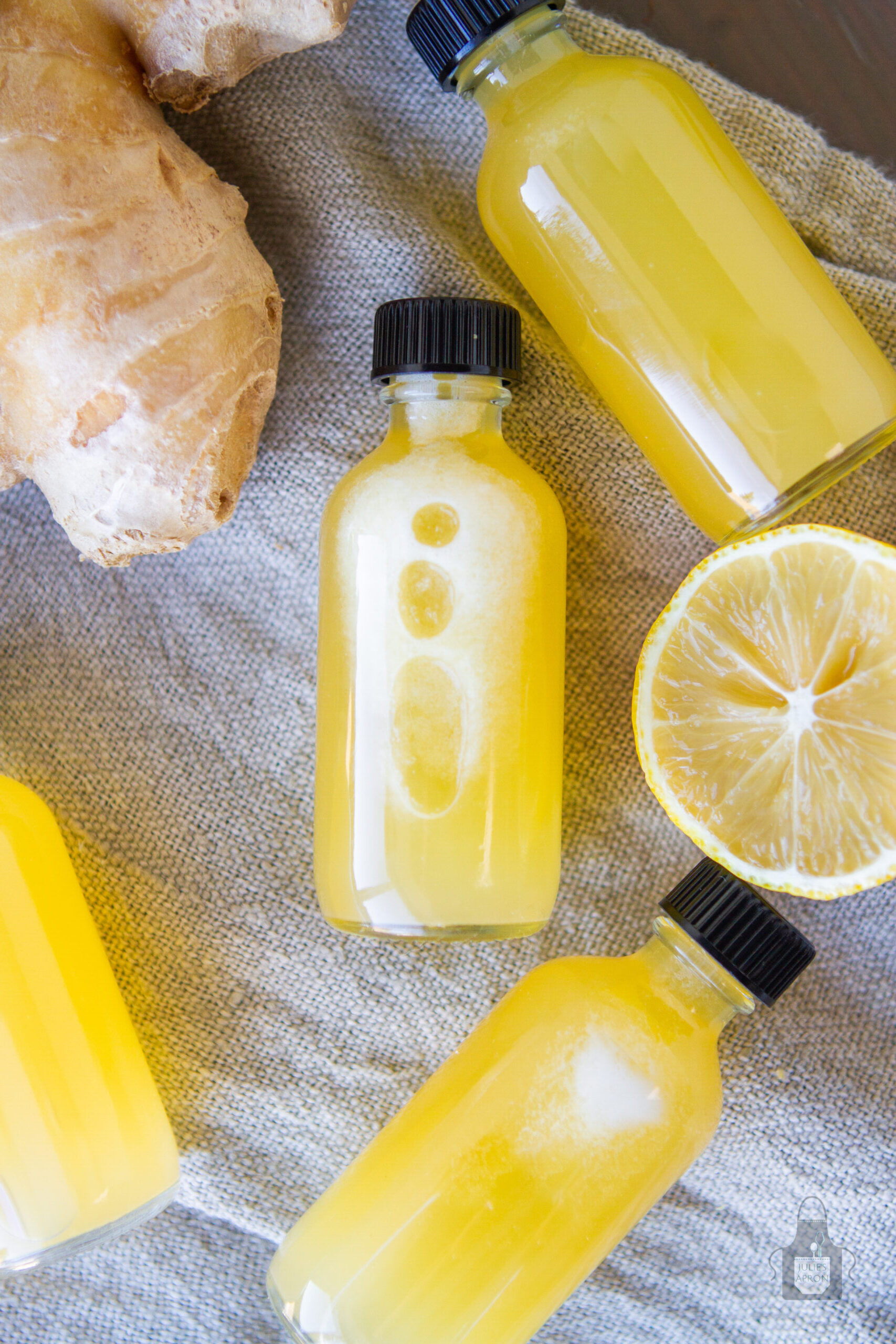 bottles with ginger lemon  laying flat