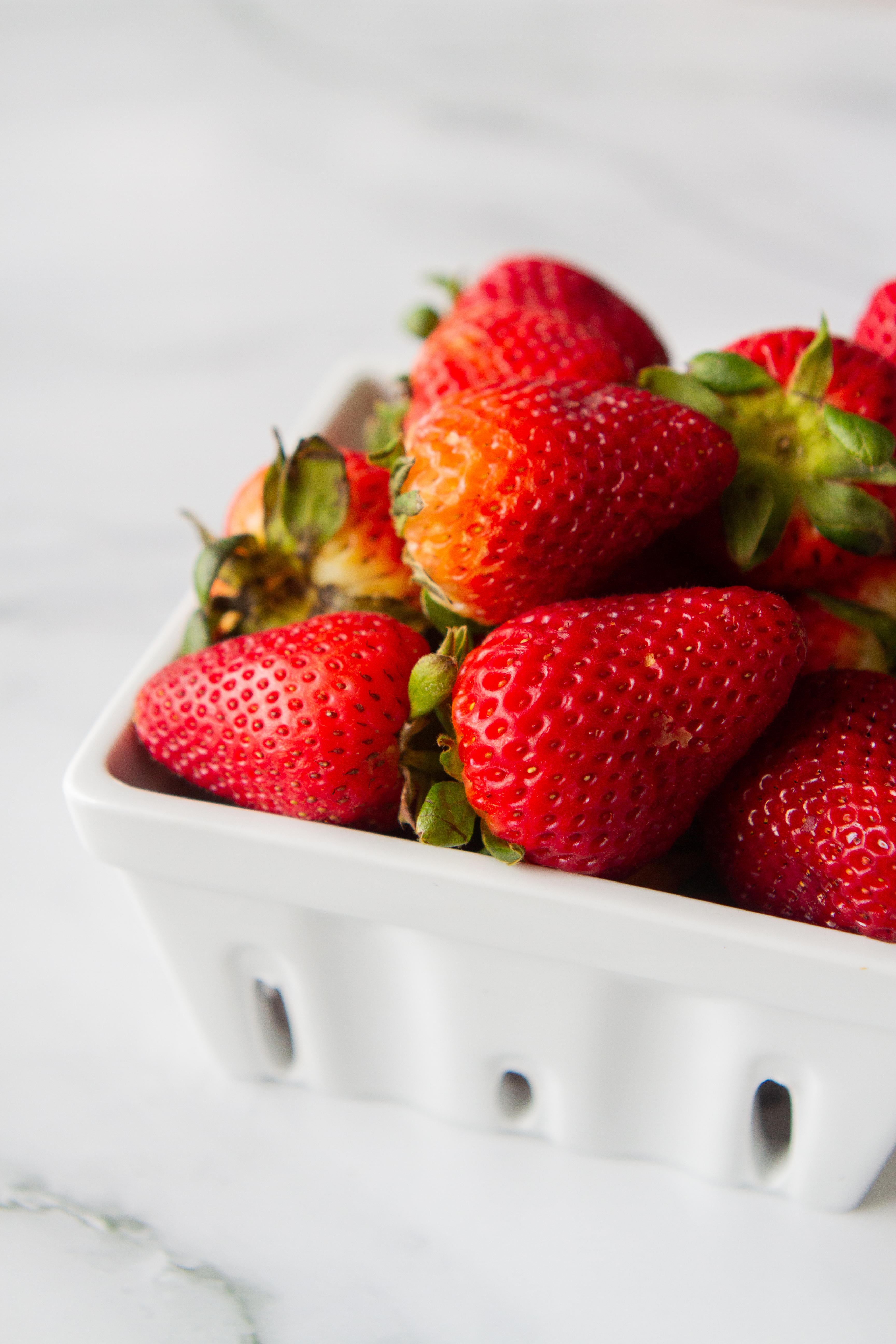 strawberries in a ceramic basket