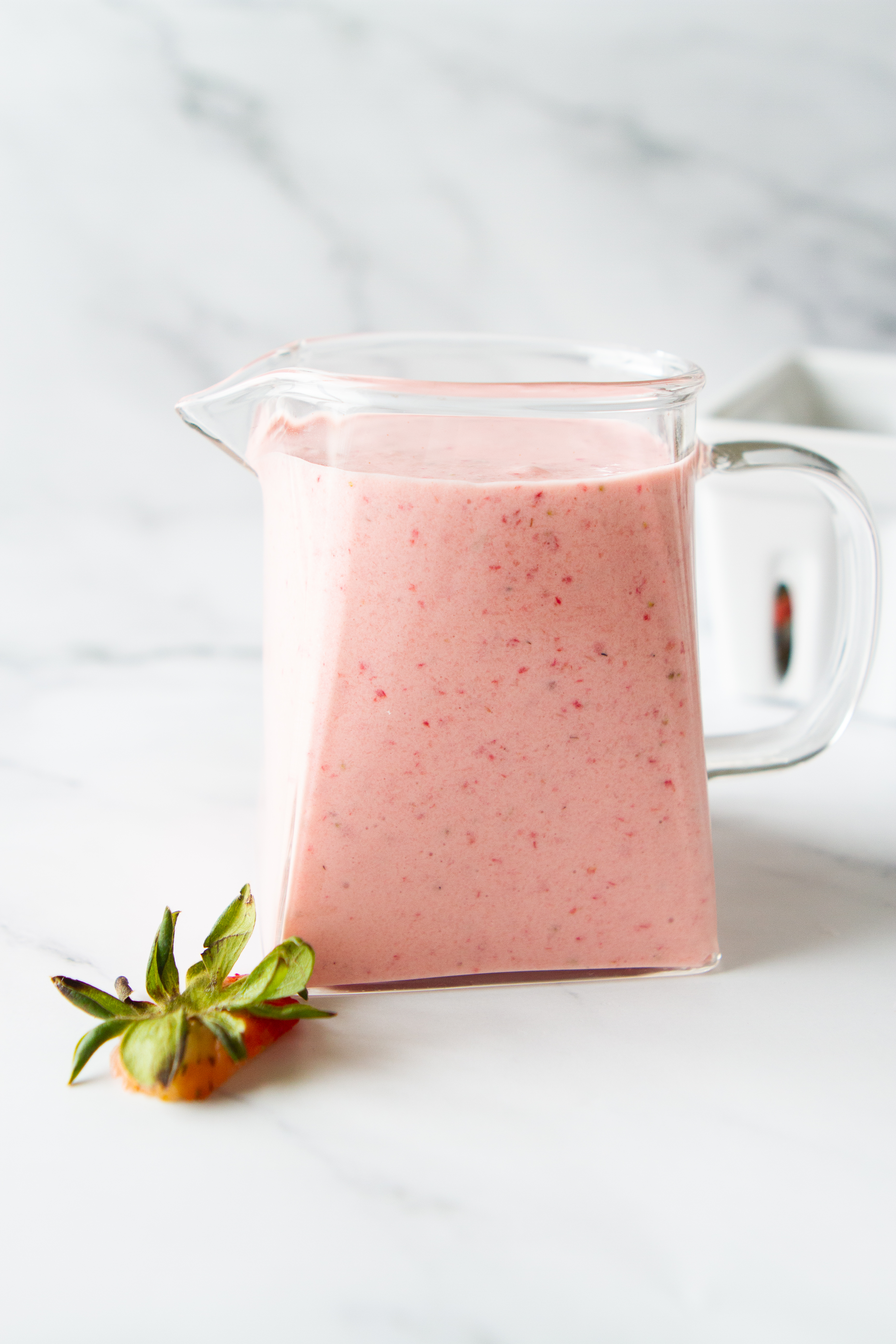 pitcher with blended strawberries