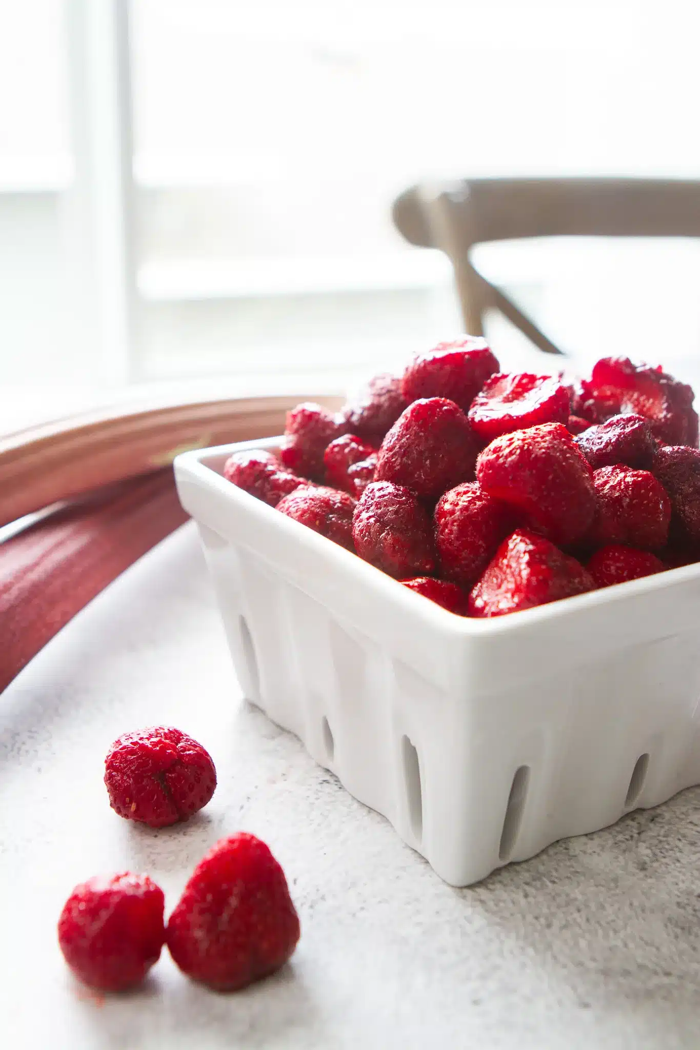 ripe strawberries in a ceramic berry basket