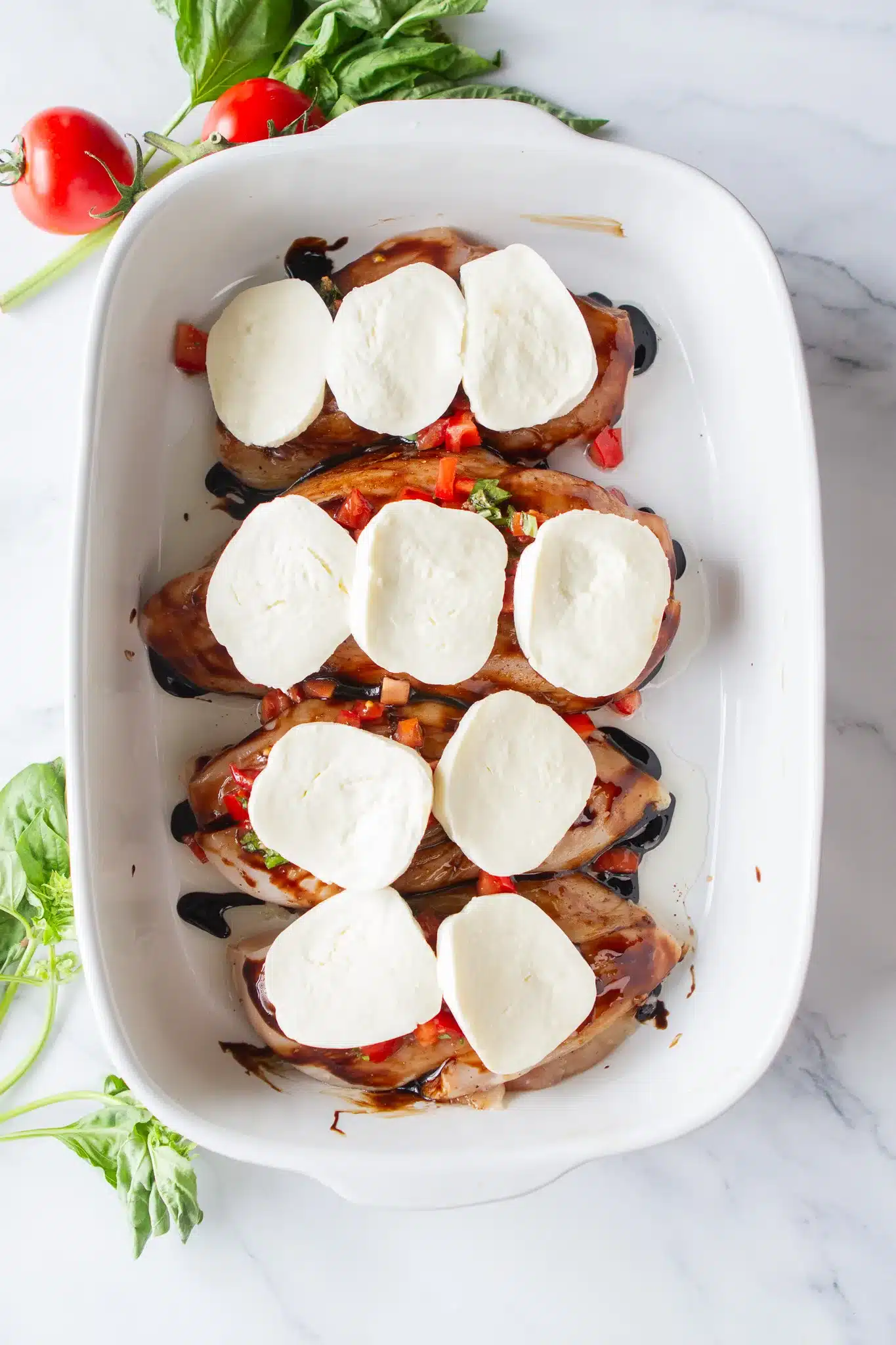 chicken breast stuffed with bruschetta and topped with fresh mozzarella slice