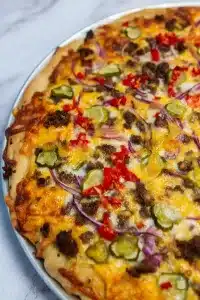 golden and crispy baked ground beef pizza