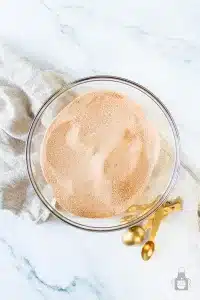 mixed together cinnamon sugar in glass bowl