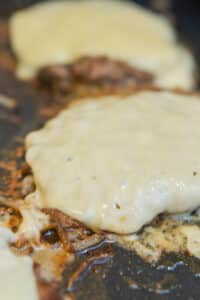 smash burgers on griddle